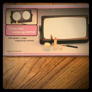 Three way make up mirror